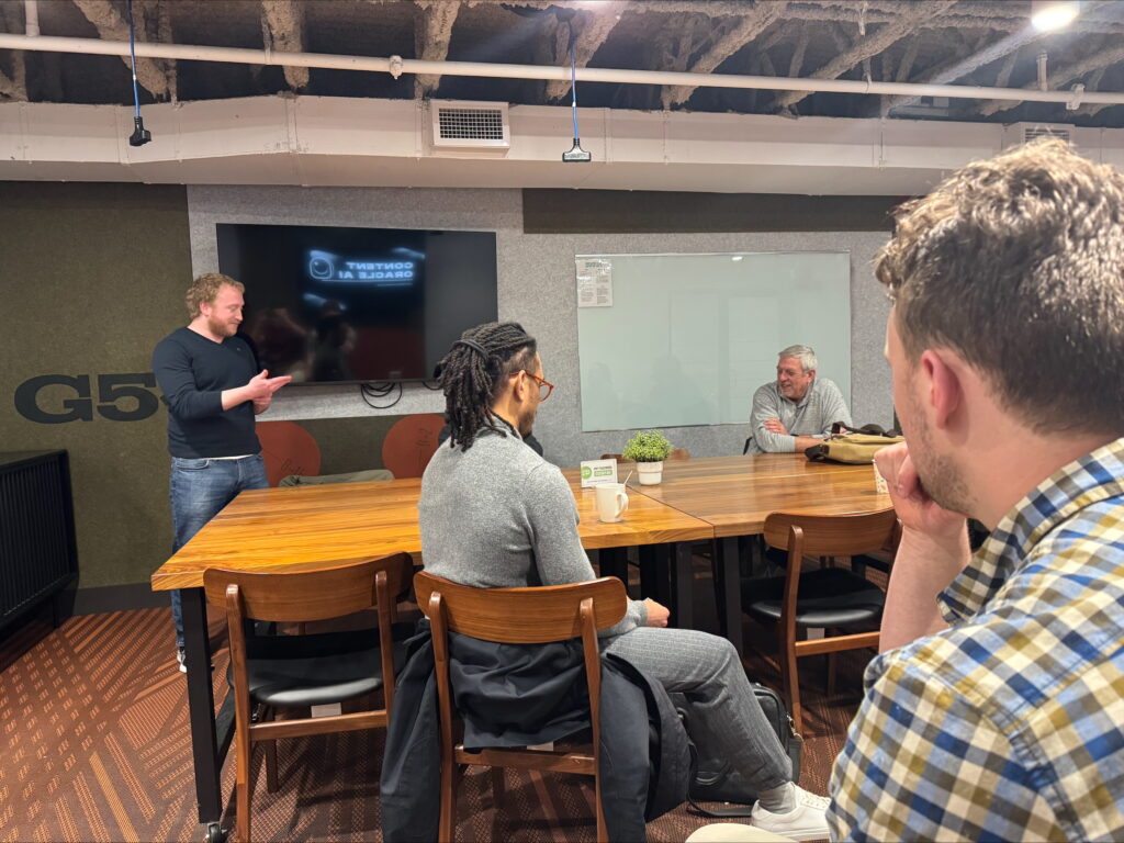 A picture of Content Oracle AI at a feedback meeting